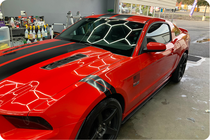 A red Mustang after a professional detail at Pacos Washer